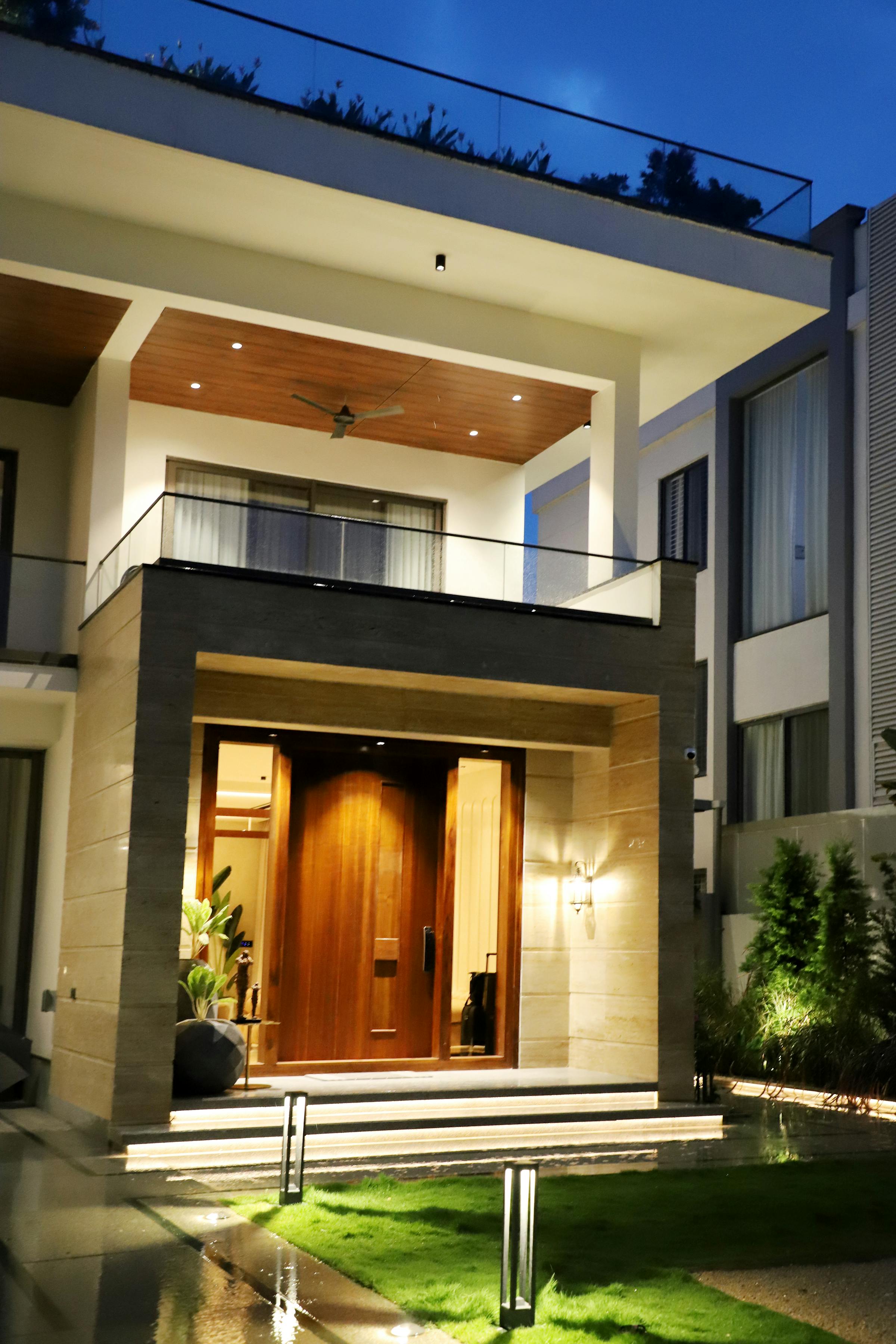 Modern luxury home exterior at night